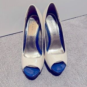 Barely worn white/blue heels.